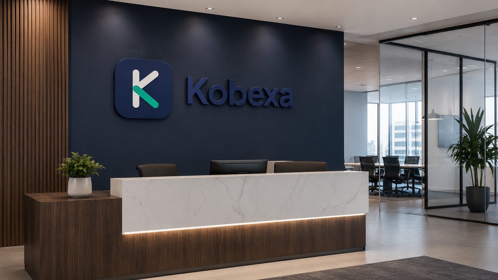 Kobexa office reception with the Kobexa logo on the wall